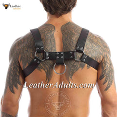 Man wearing a black leather harness with visible tattoos on a white background, featuring 'KSK Leather' branding.