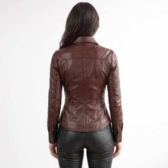 Full back view showing the streamlined fit, seam construction, and cuff detailing on a women's handcrafted brown leather overshirt.