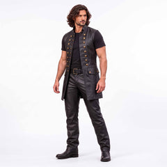 Full length front studio portrait of man modeling black leather renaissance costume vest with brass buttons and leather boots