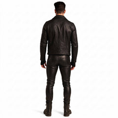 Full length back view of man wearing tailored black leather biker jacket and matching black leather button fly jeans