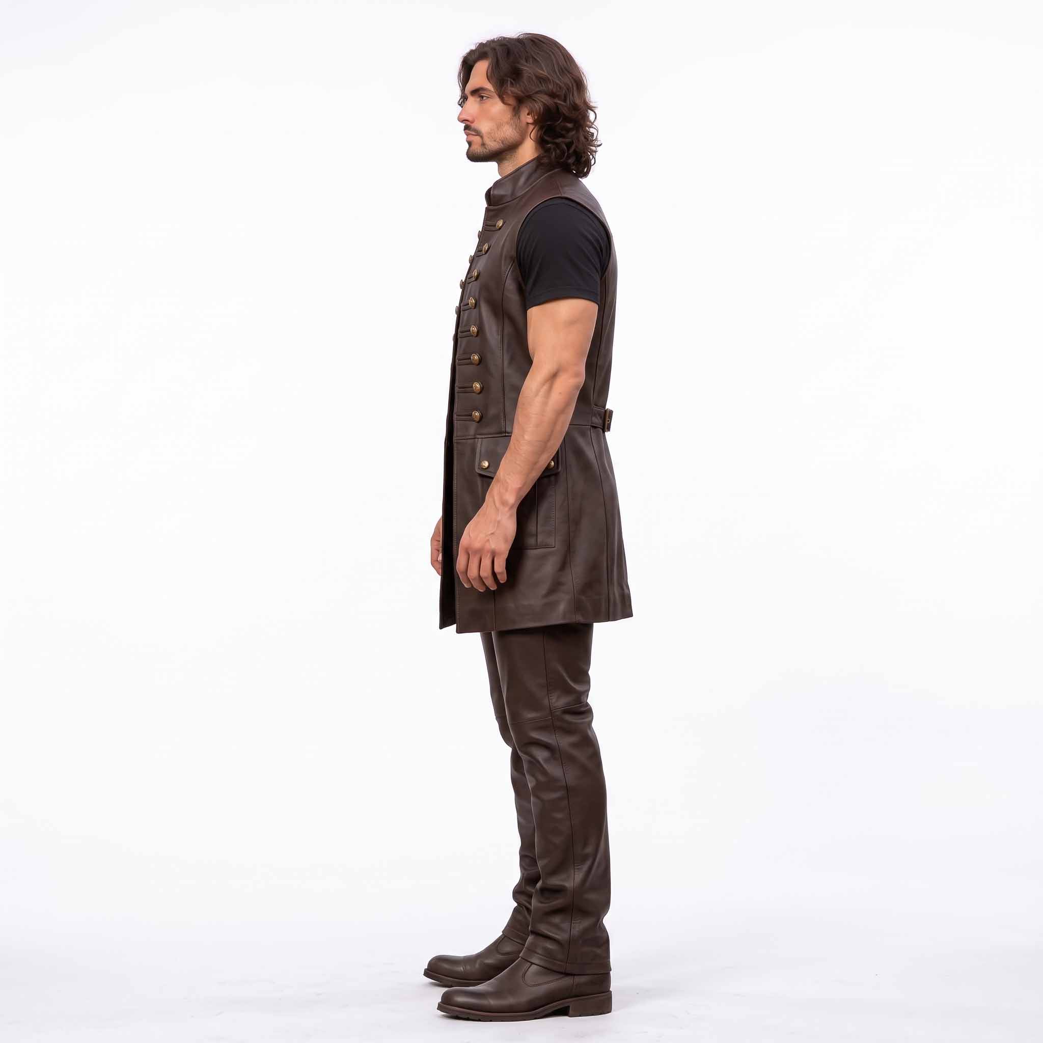 Side profile 90 degree view of man wearing tailored long brown leather medieval waistcoat showing armhole cut and flap pocket