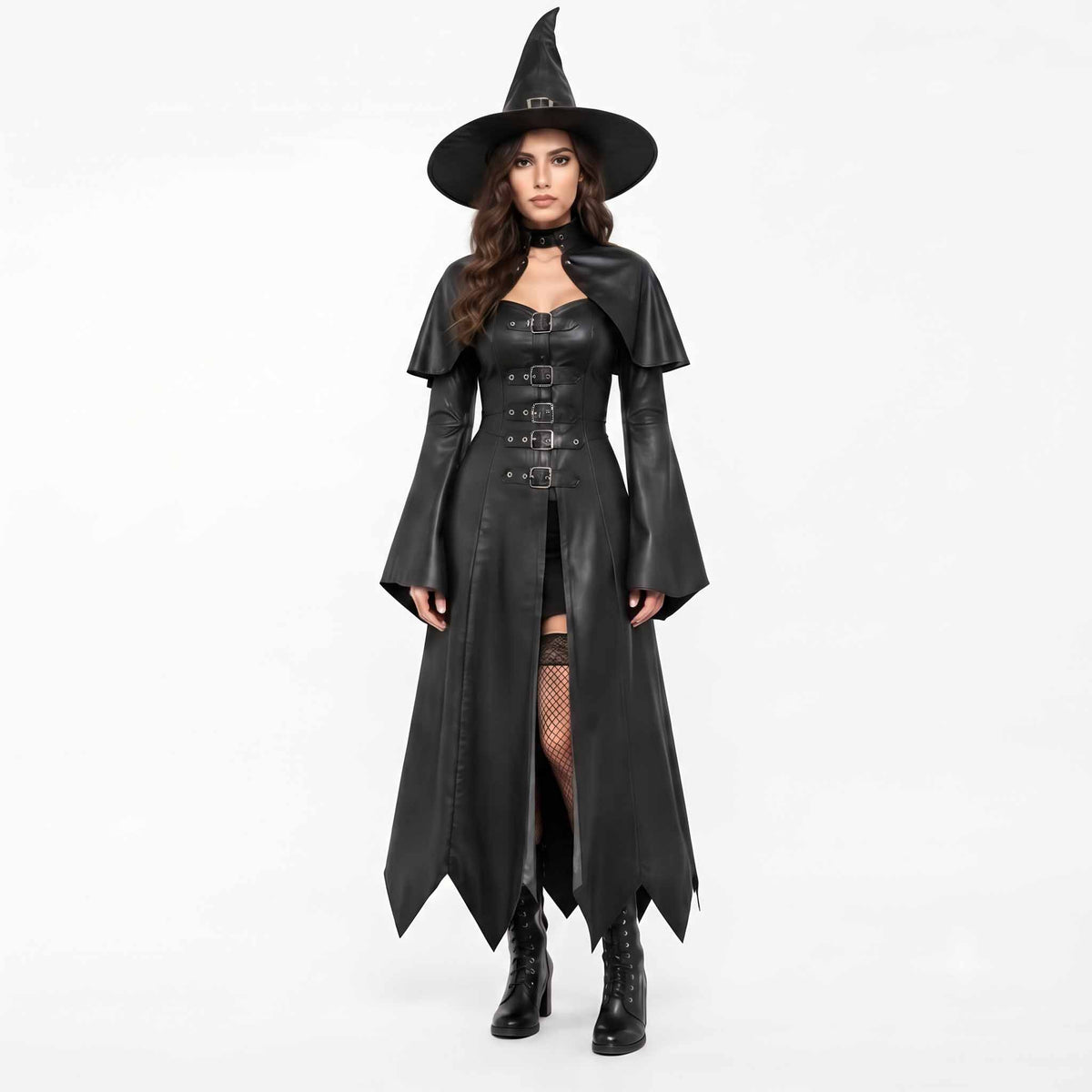 Full front view of a woman wearing a handmade black leather witch costume dress with flared bell sleeves, buckled bodice, pointed hem, and matching pointed witch hat.