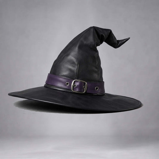Studio shot of the handmade black leather witch hat accented with a purple band and metal buckle.