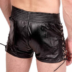 Back view of men's soft lambskin leather shorts showing back patch pocket, ribbed elastic waist, and side lacing details.