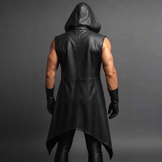 Back view of man modeling sleeveless black leather trench coat showing deep cowl hood, tailored vertical spine seams, and split tail hem