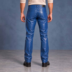 Back view of men's blue leather pants highlighting dual patch pockets, waistband patch, and slim tailoring