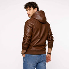 Rear three quarter studio angle of man in brown genuine sheepskin leather sweatshirt displaying sleeve gather and hood construction