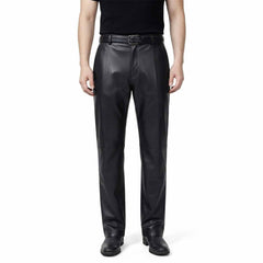 Full-length front view of a man wearing classic-fit blsck leather formal trousers with a smooth finish and straight leg.