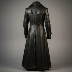 Back full view of black genuine cowhide leather gothic overcoat showing studded storm capelet, contoured waist seams, and center split walking vent
