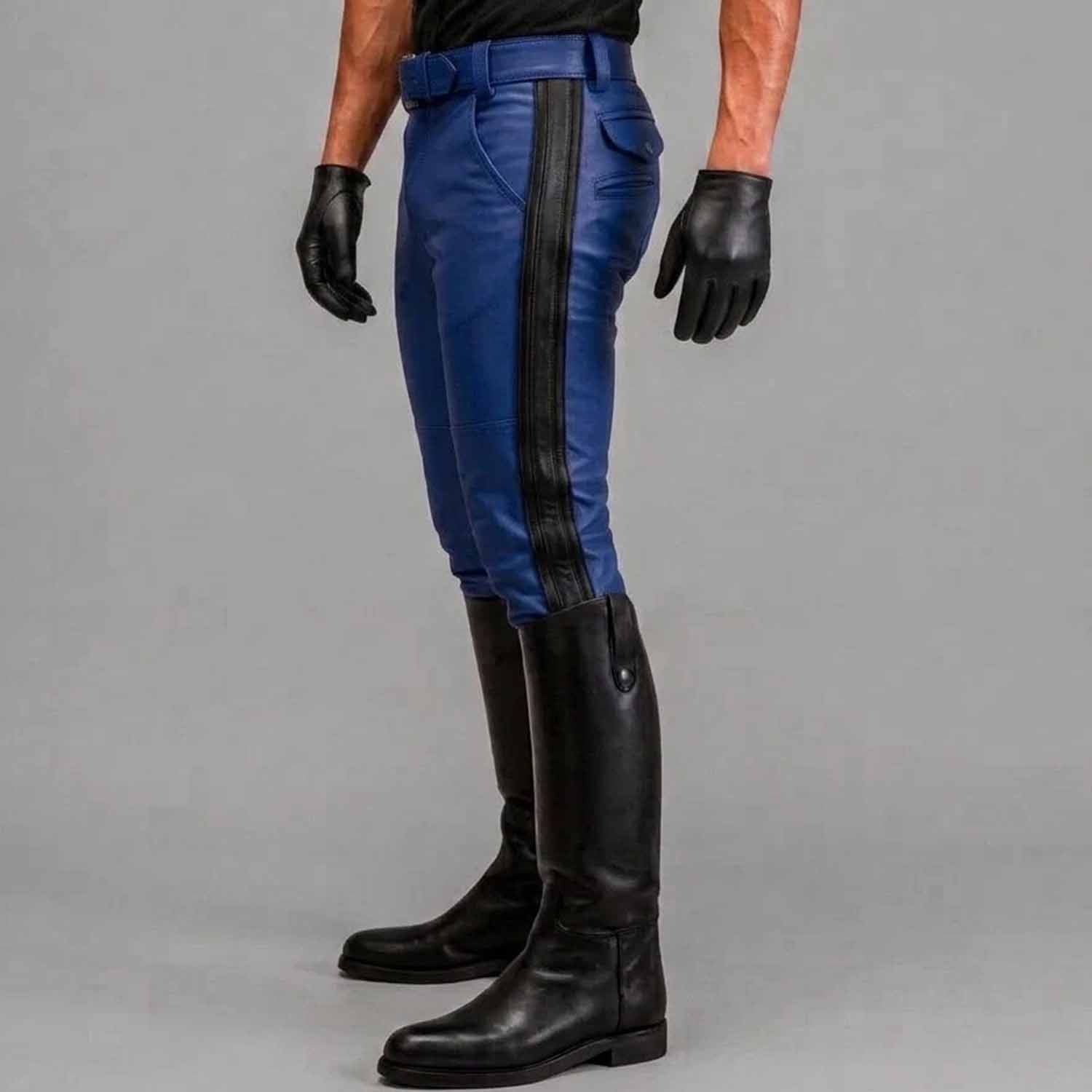 Side profile view highlighting the slim tapered leg, mid-rise fit, and striking vertical white stripe detail of the leather breeches.
