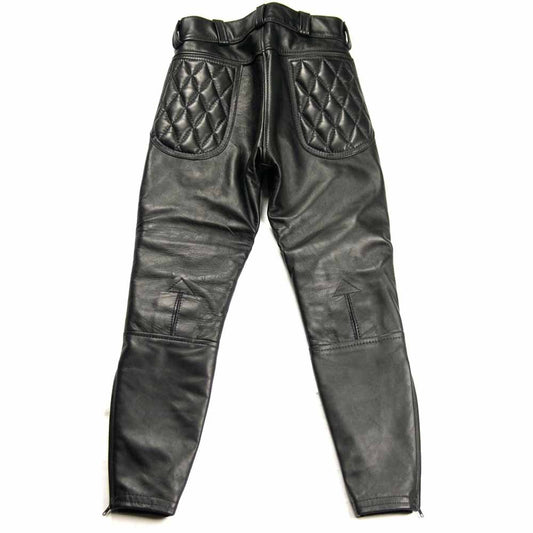 Flat lay back view of men's black cowhide leather breeches displaying diamond-quilted rear pockets and ankle cuff zippers.