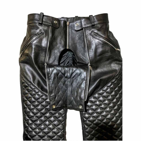 Close-up of men's leather kink pants showing the open front panel with double YKK zippers.