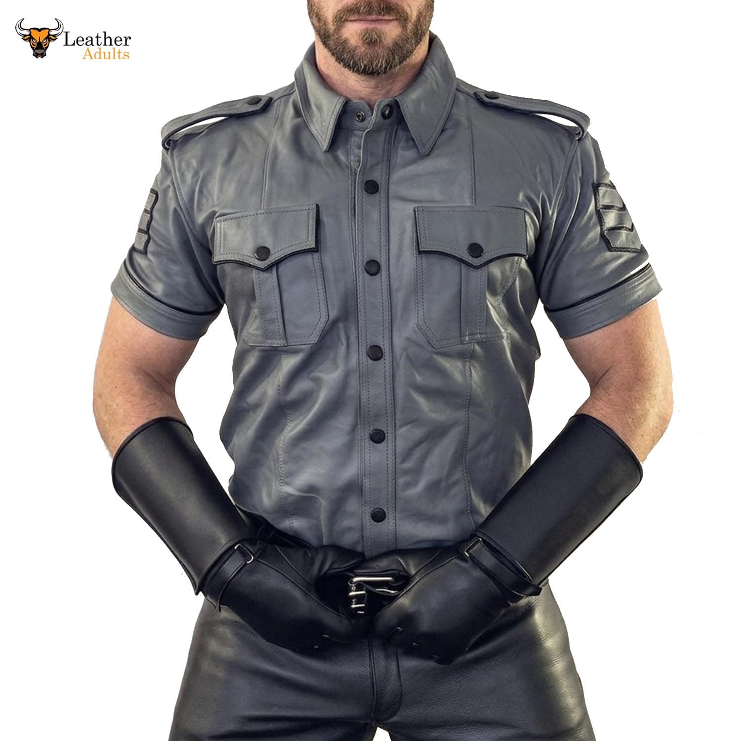 Man wearing a gray leather shirt and black leather gloves on a white background