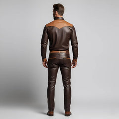 Back view showing the contrast tan western yoke and reinforced back pockets on the men's brown handmade leather shirt and pants set