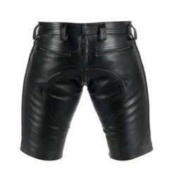 Rear view of men's genuine black leather shorts showing the full two-way zipper extension, back patch detail, and dual zippered back pockets.