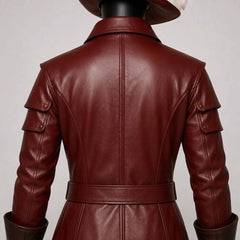 Close up rear shot of red leather captain frock coat detailing back panel tailoring seams and waist belt band
