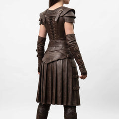 Rear three-quarter studio angle showing back bodice lacing, buckled vambrace arm guards, and pleated leather skirt on white background