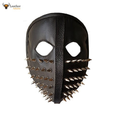 A full face leather mask with spikes, primarily black in color with silver spikes decorating the side.