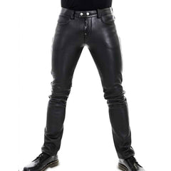 Black leather slim-fit jeans shown on a model from the waist down, paired with black leather boots against a white background.