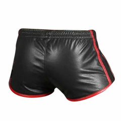 Black leather athletic shorts with red piping trim along the side and hem, shown against a plain white background.